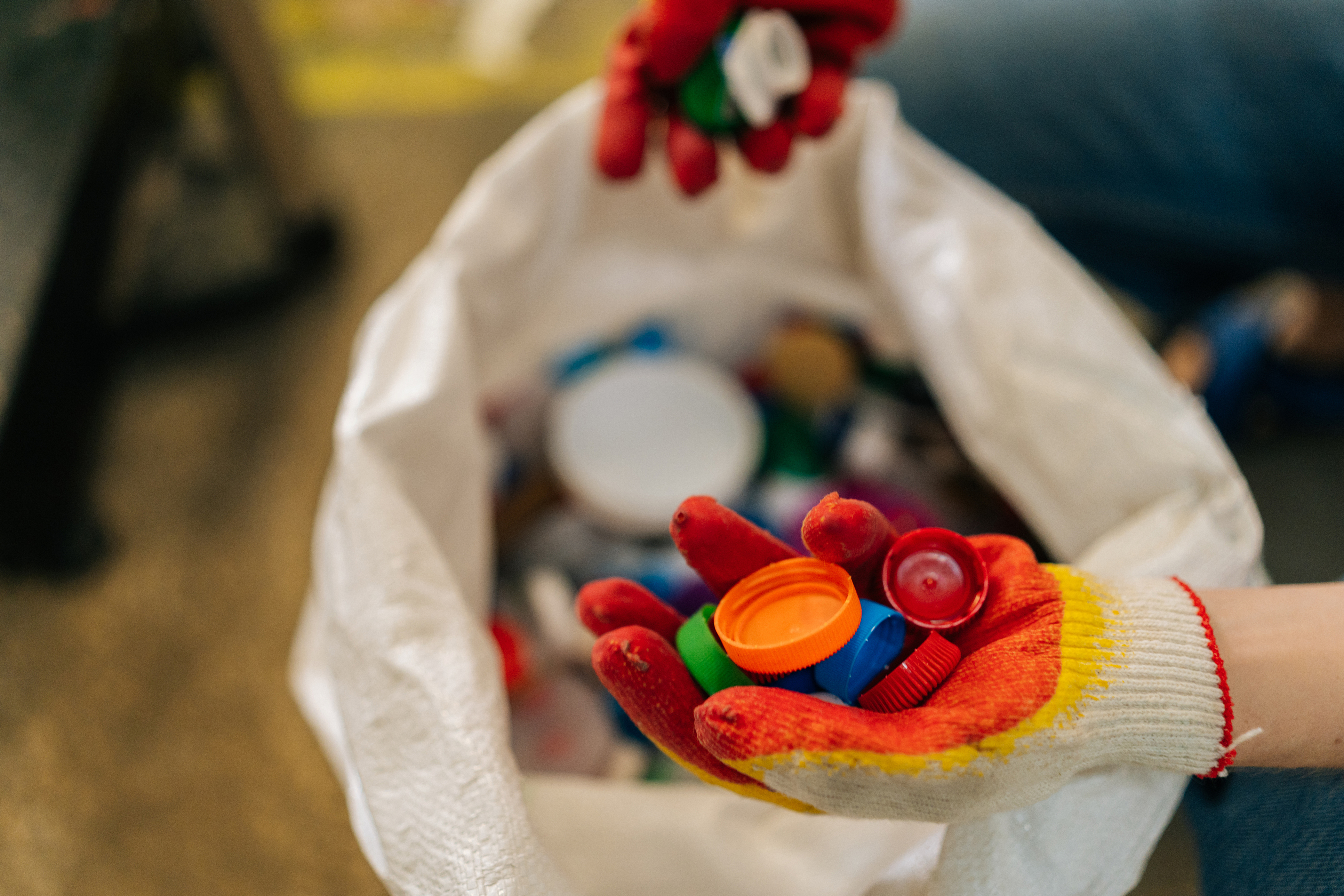 A bag containing bottle tops for recyling