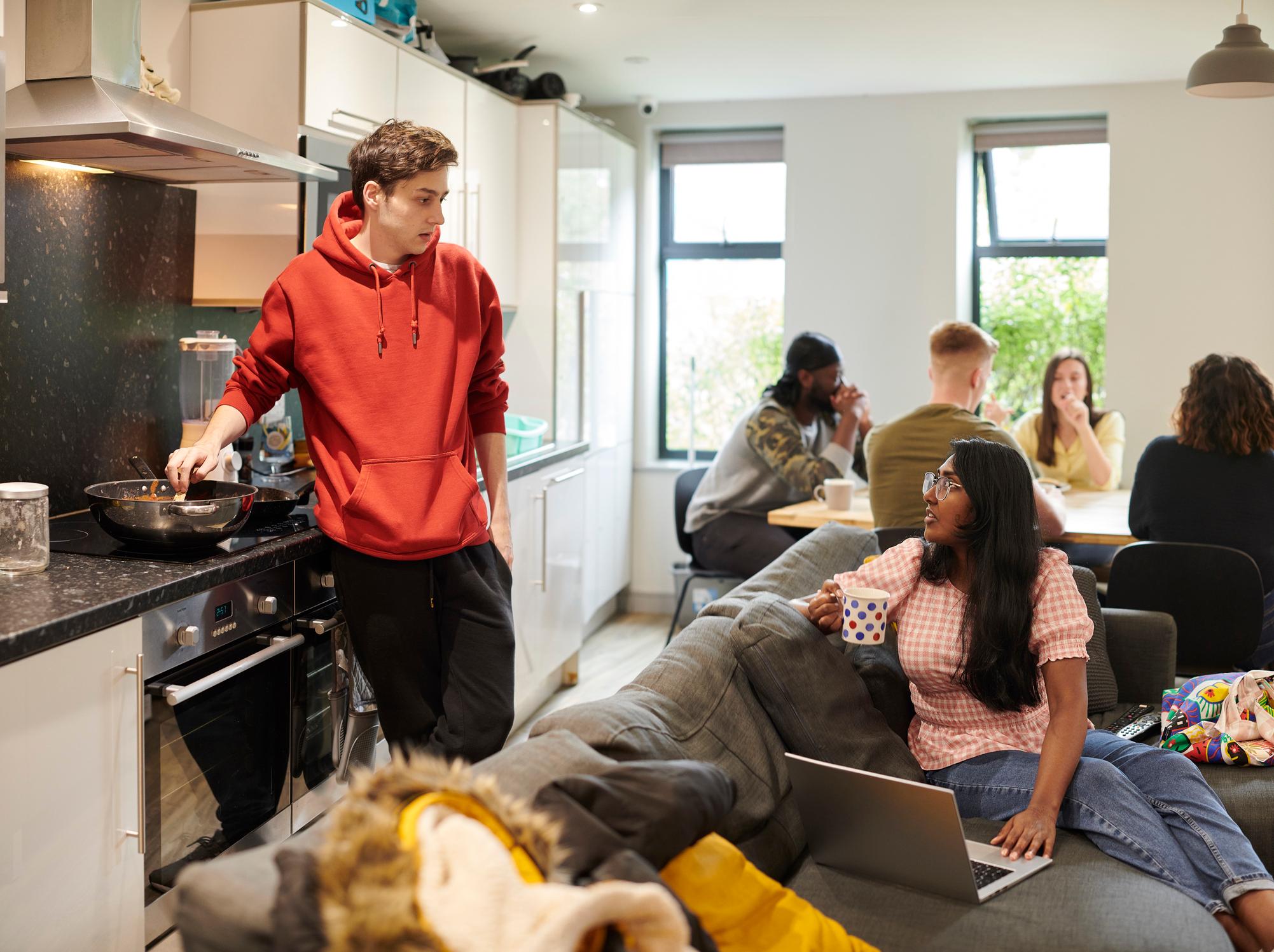 students in a university dorm kitchen